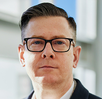 VD-porträtt av Alexander Hughes, kryptohandelsföretagets chefskraft
